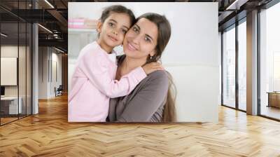 Happy young mother with daughter Wall mural