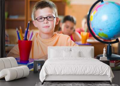 Schoolchildren in classroom at school Wall mural