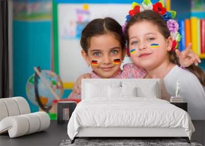 two happy girls in international summer camp Wall mural