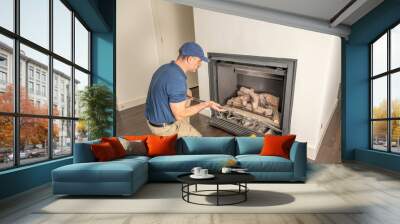 Technician working on a gas fireplace Wall mural