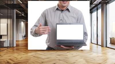 portrait of confident young man advertising laptop Wall mural