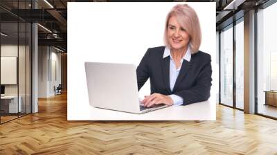 Senior business woman with laptop. Isolated Wall mural