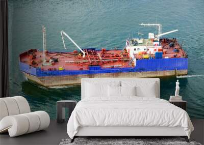 Elevated view of freighter ship in Estacio Maritima, Port Vell, Old harbor of Barcelona, Spain Wall mural