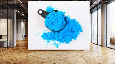 Copper II sulfate, also known as blue vitriol, bluestone, vitriol of copper, and Roman vitriol. On white background. Wall mural