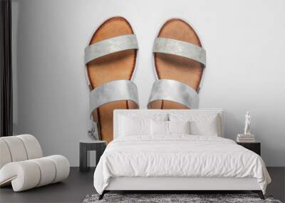 Fashionable female sandals on a white background. Top view Wall mural