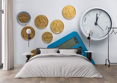 Time is money. Clock with calculator and coins on white background. Top view Wall mural