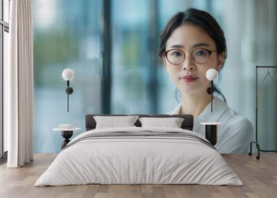 Portrait of a Young Woman in Glasses Against a Window, Photography, Portrait , Glasses , Woman , Office Wall mural