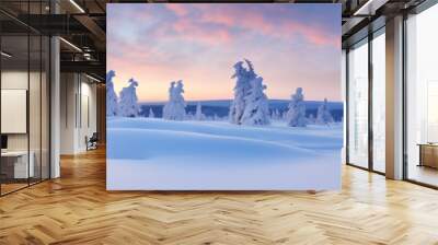 Ultrawide snowy tundra landscape featuring snow-clad evergreens and a golden-hour sunset sky Wall mural