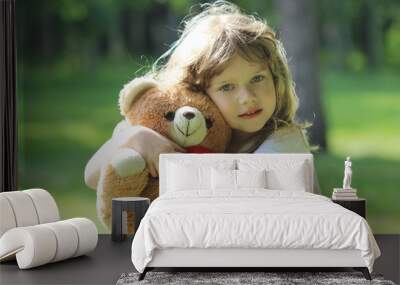 Little girl and teddy bear Wall mural