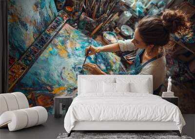 Female Artist Creating Vibrant Acrylic Painting in Artistic Studio Environment Wall mural