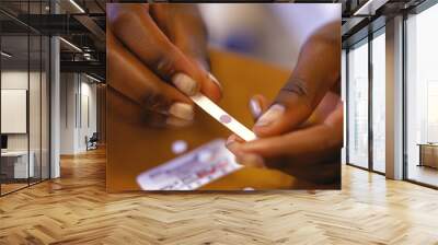 Hands Using an HIV Self-Test Kit - Essential for Quick, Private Health Assessments Wall mural