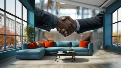 Professional Handshake Symbolizing Successful Business Consulting in Modern Corporate Office Wall mural