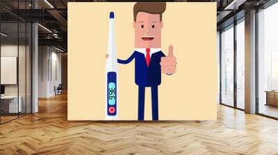 Young businessman holds a thermometer with a reading of 36.6 degrees and shows a thumbs up sign Wall mural