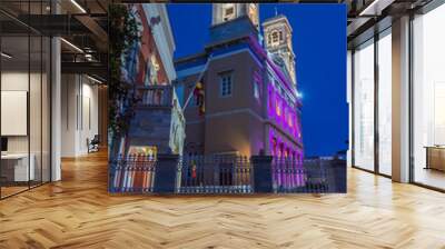 Τhe imposing church of Saint Nicholas, illuminated in purple mourning colours 2 days before Easter. Wall mural