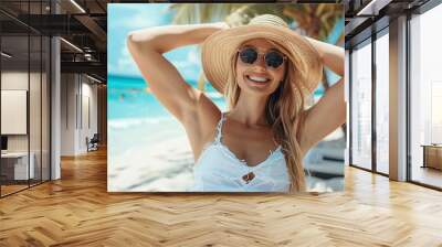 smiling woman in straw hat on beach Wall mural