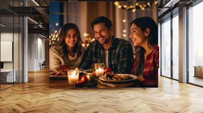 Family celebrating Christmas at home, having dinner Wall mural