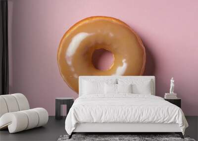 Delicious donut on cute pink background. Wall mural