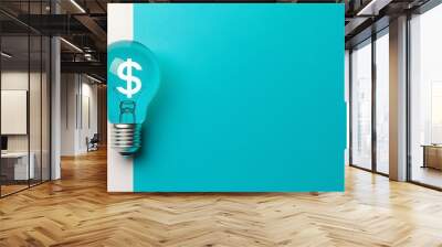 Innovative 3D lightbulb with a holographic dollar sign on a minimalist blue and white background symbolizing business growth new ideas and financial success Wall mural