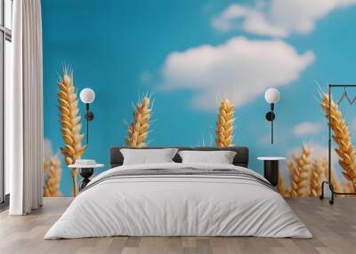 Picturesque summer landscape with a vast wheat field swaying in the gentle breeze under a clear blue sky dotted with puffy white clouds creating a serene and tranquil pastoral scene Wall mural