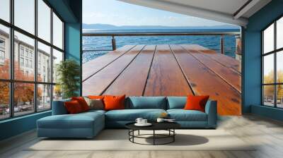  wooden table by the sea, close up Wall mural