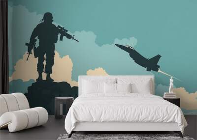 Silhouette of a soldier on top of a mountain with a gun and a jet fighter in the background Wall mural