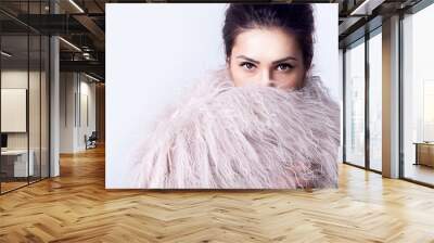 Portrait of attractive stylish woman in fur against  white background. Wall mural