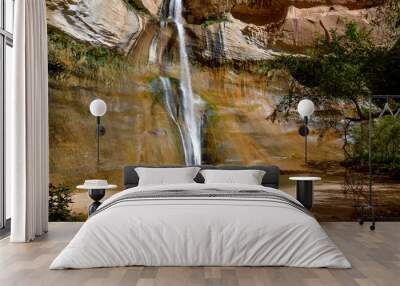 girl standing near plunge pool at the bottom of Lower Calf Creek falls 
Grand Staircase - Escalante National Monument, Utah Wall mural