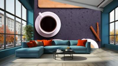 a white ceramic cup of black roasted coffee espresso and a french croissant on the wooden surface Wall mural