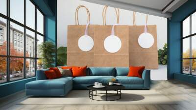 Brown paper retail bag tag mockup - three bags Wall mural