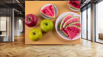 fresh and ripe watermelon on yellow background. minimalism style Wall mural