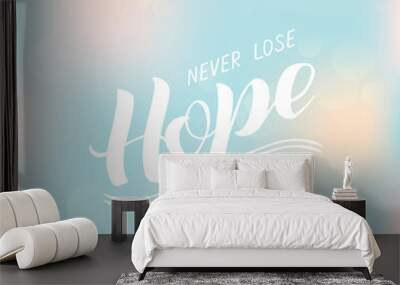 Vector illustration of never lose hope lettering for banner, postcard, poster, clothes, advertisement design. Handwritten text for template, signage, billboard, print. Imitation of brush pen writing
 Wall mural