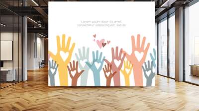 Raised hands. Volunteering, teamwork concert. Wall mural