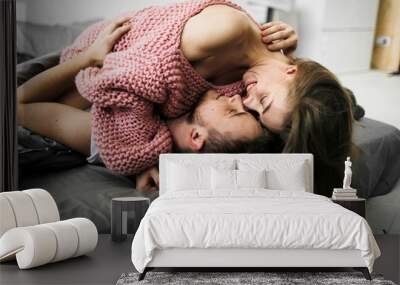 Sensual romantic foreplay by couple in love in bed. Arrwork. Wall mural