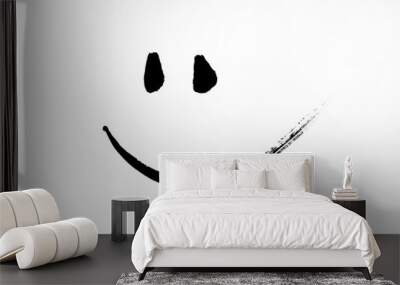 Simple smiley smiley face in black painted on a piece of paper. Wall mural