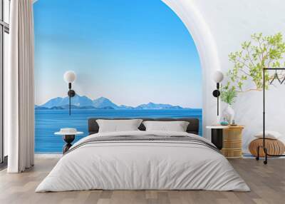 Seaside view from a stylish balcony overlooking tranquil waters and mountains Wall mural