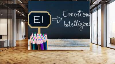 business acronym ei emotional intelligence written with chalk on wooden mini blackboard labels Wall mural