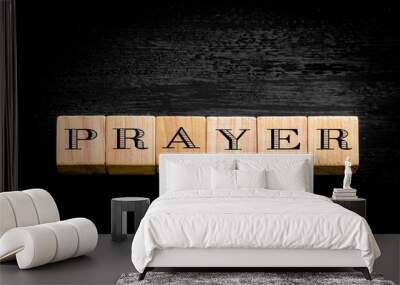 Word Prayer isolated on black background Wall mural