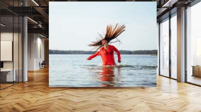 blonde woman on water background Wall mural