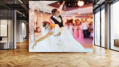 Happy bride and groom their first dance Wall mural