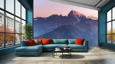 Magic autumn landscape and snow-capped mountain peaks. View of t Wall mural