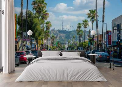 Sunny day in Koreatown, Los Angeles with palm trees and busy street Wall mural