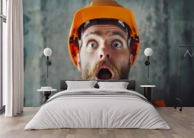 Surprised construction worker in hard hat closeup portrait Wall mural