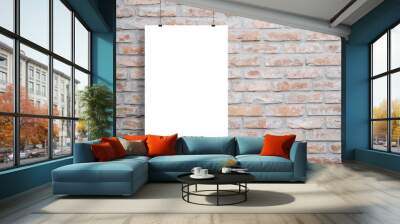 Blank poster mockup hanging across brick wall with copy space beside Wall mural