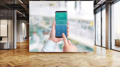 Hospital App concept on smart phone with Coronavirus positive findings. Close-up. Laboratory in background Wall mural