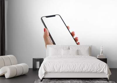 Smartphone with notch in woman hand close-up. Isolated screen and background in white for app presentation Wall mural