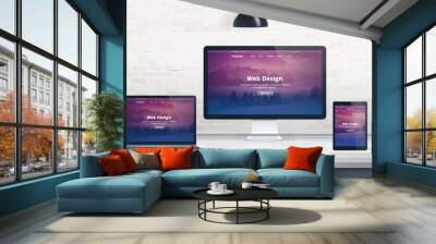 Web design, developer studio concept with responsive web page on multiple displays. Wall mural