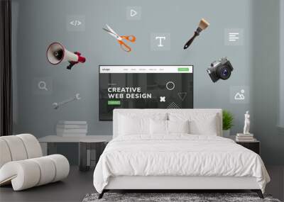 Web design studio with flying tools and web page icons around computer display featuring concept agency page. Creative illustration of digital workspace Wall mural