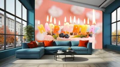 Birthday cake with candle title Happy Birthday on beautiful cake with berries background of white clouds and pink sky. Close-up Wall mural