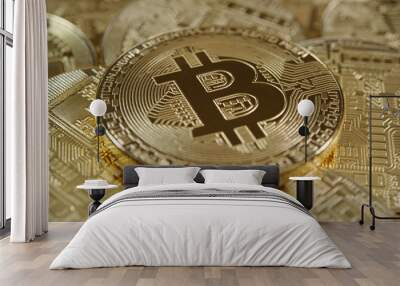 Bitcoin lying on stack of other bitcoins Wall mural