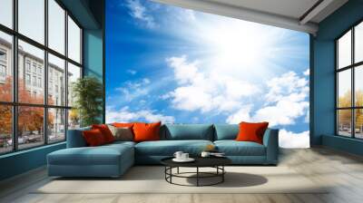 Blue sky with bright sun. Wall mural